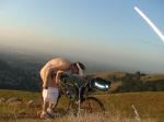 Pulling down his boxers to moon the city?
