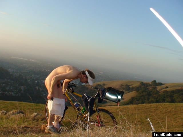 Pulling down his boxers to moon the city?