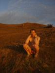 Sitting in the grass nude at sunrise!