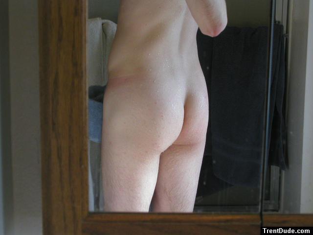 butt in a mirror with water