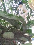Nude tree clmibing