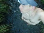 Undressing in a creek (8 Minutes) 48MB WMV file (use the download option)