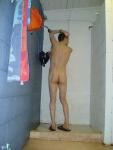 Scrubbing his ears with soap, butt