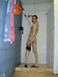Washing the chlorine off his legs to prevent too much absorption