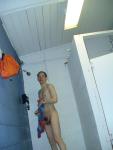 Drying off in the swim locker room shower, pubic hair