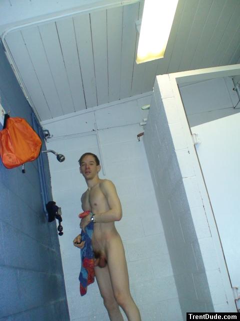 Drying off in the swim locker room shower, pubic hair