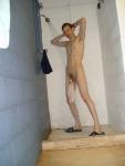 swim brief hanging from the the circumcised glans of his penis (best) (armpit)