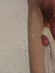 Closeup of swim brief hanging from penis