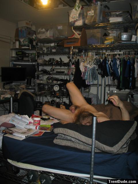 Laying nude in bed