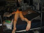 The skin on his legs shines due to consuming dietary fats such as raw fish oil and raw flaxseed oil