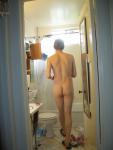 Nude before a shower