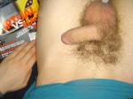 flaccid penis in bed reading a magazine